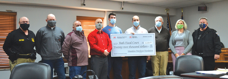 MPL employees holding a giant check in the amount of $22,000