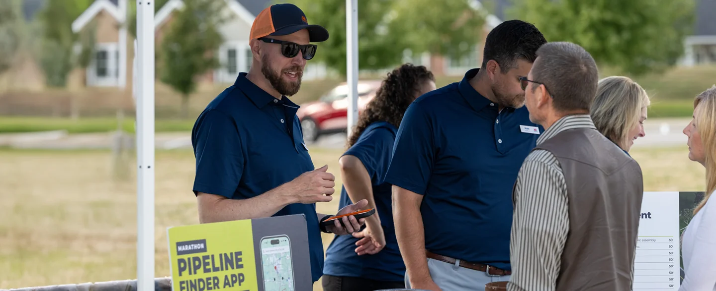 Marathon Pipe Line employees talking to people at an MPL 811 booth